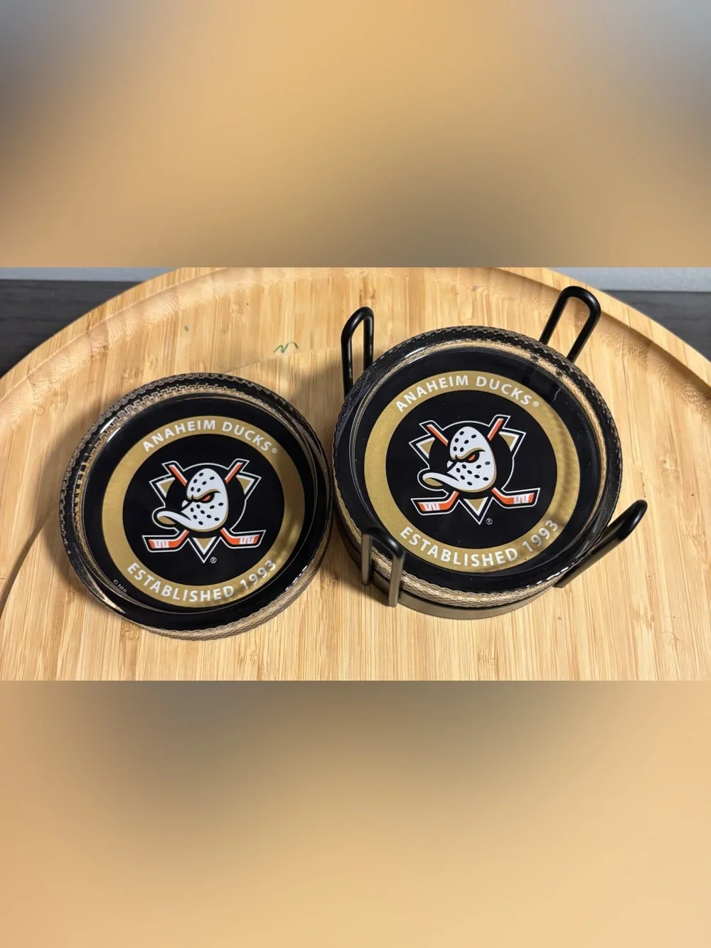 NHL Anaheim Ducks Black and Gold Puck Glass Coaster Set